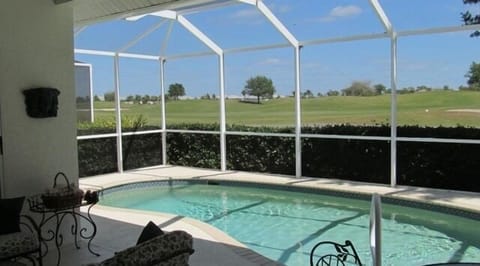 Pool area & lanai with view of golf course