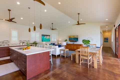 This central gathering space connects seamlessly, ideal for entertaining or simply unwinding after a day at the beach.