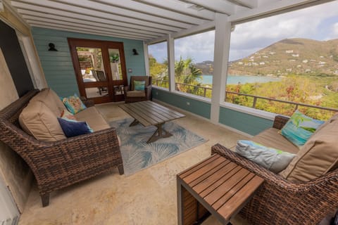 Screened in porch overlooking Fish Bay