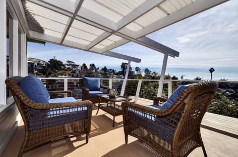 Large sunny 180 degree ocean view deck