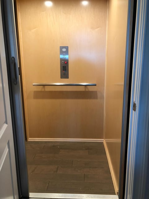 The Elevator transports Guests from the garage level to the top floor.