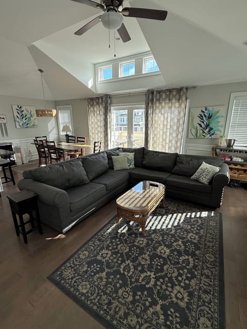 Living area has large comfortable sectional fireplace and large flat screen tv