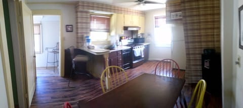 Kitchen looking into tiny porch