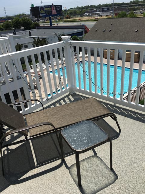 Top Floor Master Bedroom sun deck with Pool view