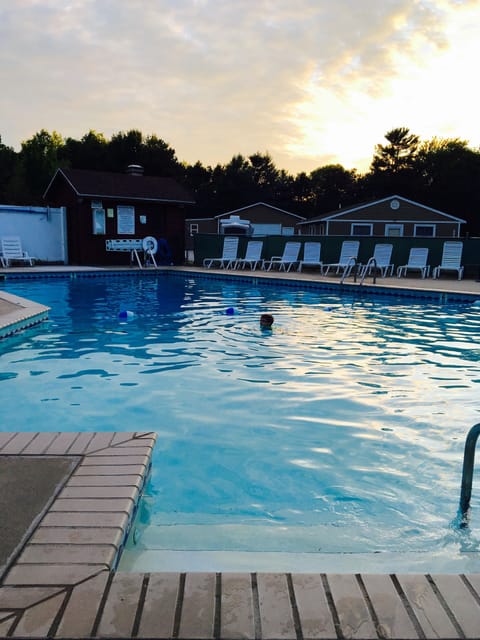 Heated pool with slide