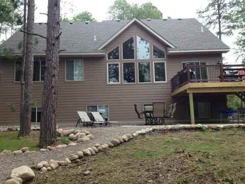 Back of house. Lots of windows with lake views.