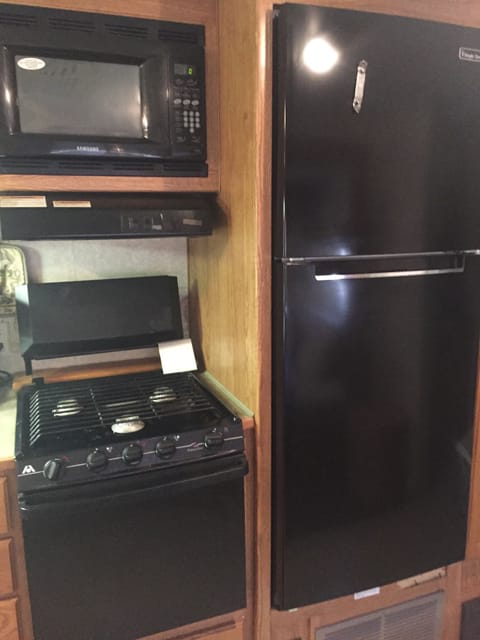 Stove, refrigerator, micro wave , coffee maker!
