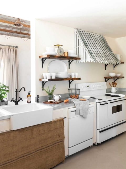 Kitchen with farm sink and tons of charm