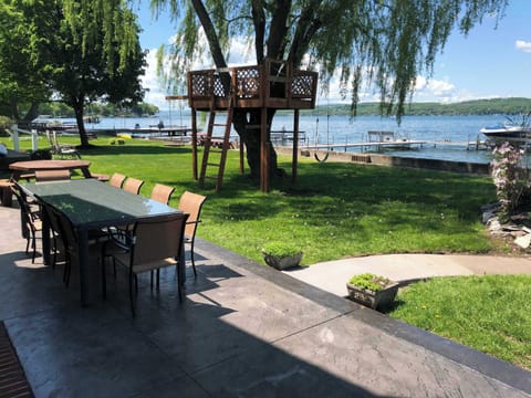 Outdoor dining tables and treehouse