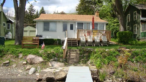 Sunny or shaded sitting areas.  Fire pit.  New handrail along steps to dock.