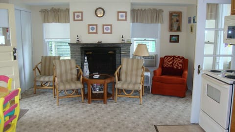 Sitting area. A/C unit in window.  Electric heat & portable heaters available.