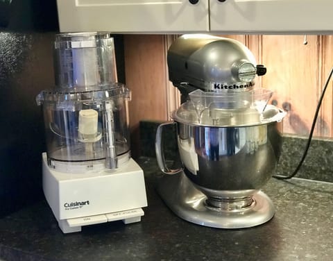 Fully stocked kitchen including a premium assortment of appliances