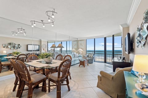 the living room has an open floor plan with fabulous views  of the ocean.
