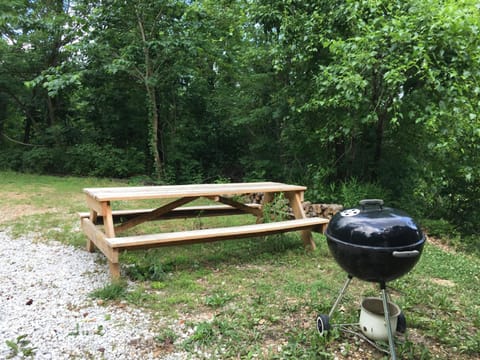 Your grill and picnic table. The table was made locally. 