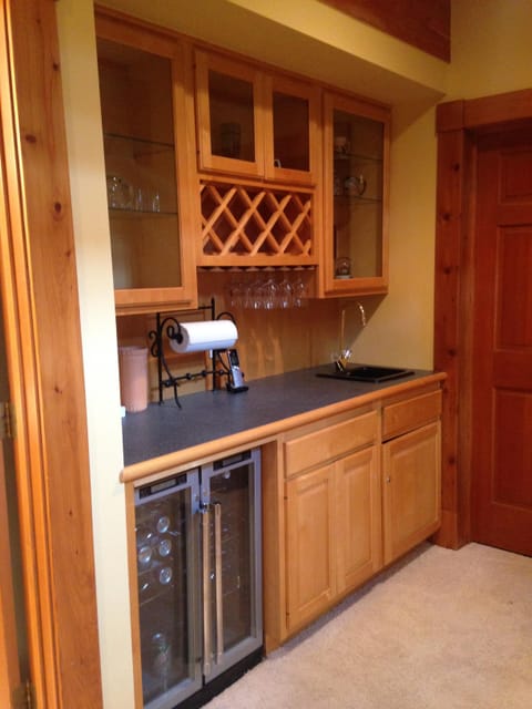 Wet bar and wine fridge on lower level