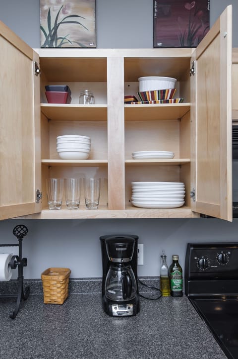 Pottery Barn plates, bowls and glassware.