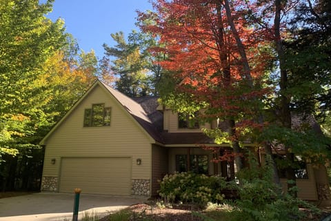 Front view of home with fall colors.