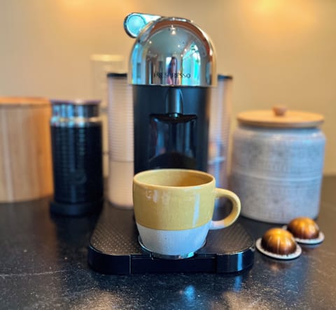 Nespresso Machine & Steamer.  We provide pods.  +Coffee pot & espresso machine. 
