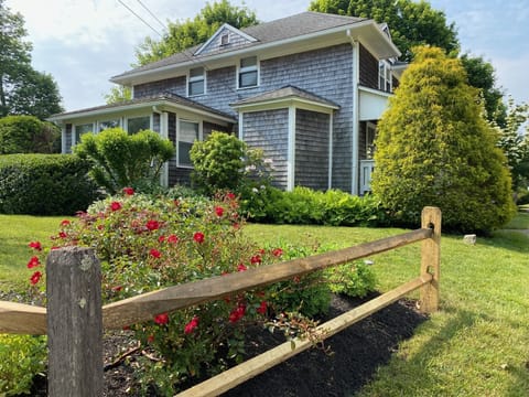 June photo of side of house.
