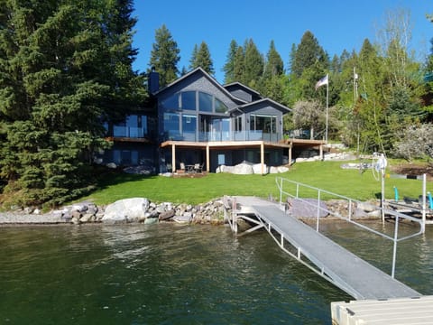Home from the dock showing lawn, access to dock,
large lakeside decks