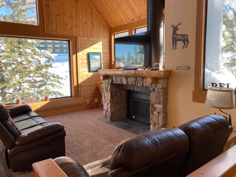 Living room with a couch and loveseat. 