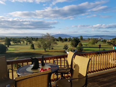 view from the deck - San Juan Islands and the golf course
