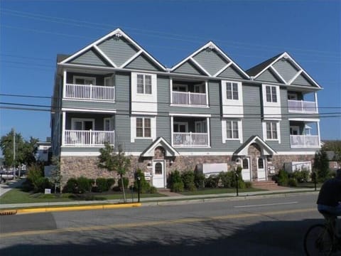 Newly Constructed Condo offerering front balcony and side deck