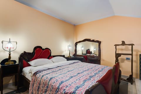 Bedroom on the Upper Floor is Equipped with Queen Size Bed 