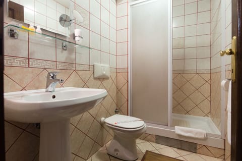 Private Bathroom Contains a Shower. Linens, Towels and Free Toiletries are There