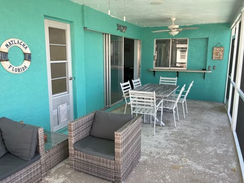 Lanai with dining and sitting areas 