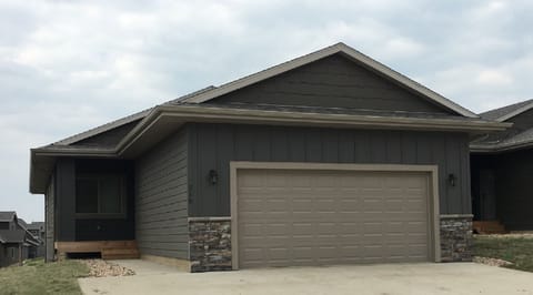 Front of cabin.  Two car garage and extra wide driveway.