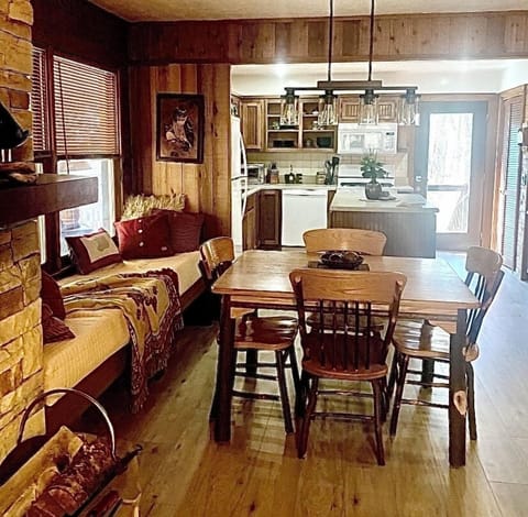 Open plan - Dining area, window seat and kitchen 