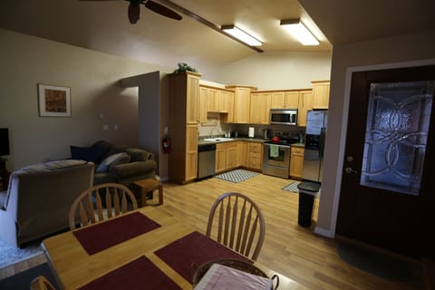 Kitchen, dining table , and living room