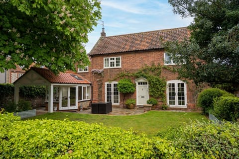 The Old Manor House, Brancaster: An exquisite red brick hideaway a mere 15-minute walk, or 3-minute drive, from the breathtaking beach