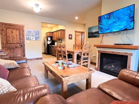 Living Room with Gas Fireplace, Flat Screen and Access to Balcony
