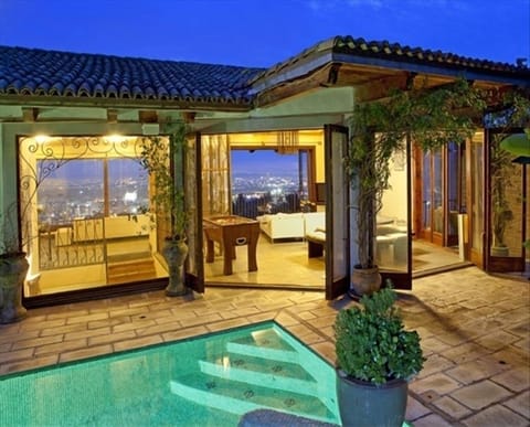 Looking across the pool and living room to the view of the city. 