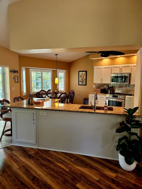 New: cabinets , countertop, stove , microwave & paint job.