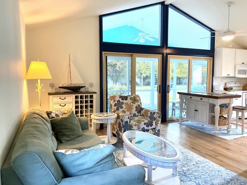 Living Room 11’4” x 16’8” with a view of Kitchen/Dining Area 12’ x 12’