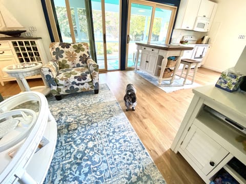 Living Room 11’4” x 16’8” with a view of Kitchen/Dining Area 12’ x 12’