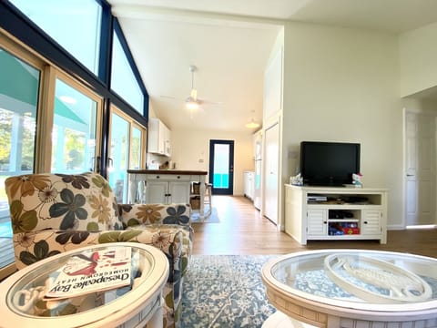 Living Room 11’4” x 16’8” with a view of Kitchen/Dining Area 12’ x 12’