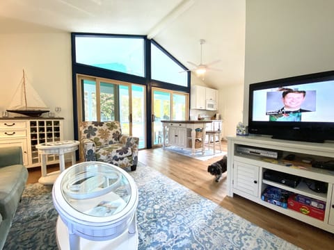 Living Room 11’4” x 16’8” with a view of Kitchen/Dining Area 12’ x 12’