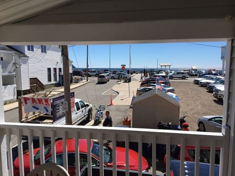 Your view from private covered front porch, directly across from the sandy beach