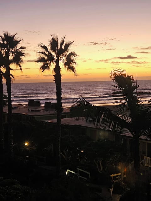 First photo of a three photo panoramic sunset from the condo, west facing. (To the  photo left are north facing condos.)