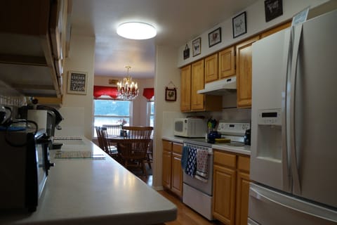 New dishwasher and oven. Corian countertops and a large fridge!