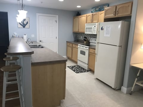 Our galley kitchen includes a coffee pot and other amenities