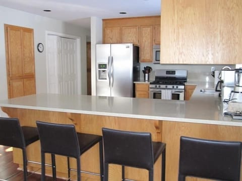 Spacious kitchen with counter seating for 4