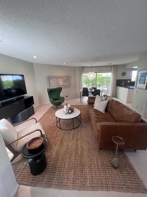 Living, dining, and kitchen beyond make up this lovely open concept area.