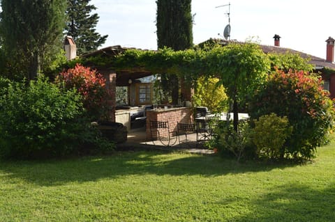 Outside kitchen, open fire & dining table for 10