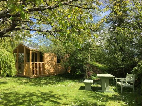 New summerhouse behind our willow tree