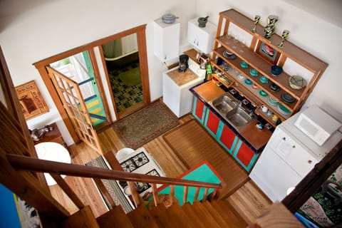  View of the kitchen from loft which has an additional queensize bed.  